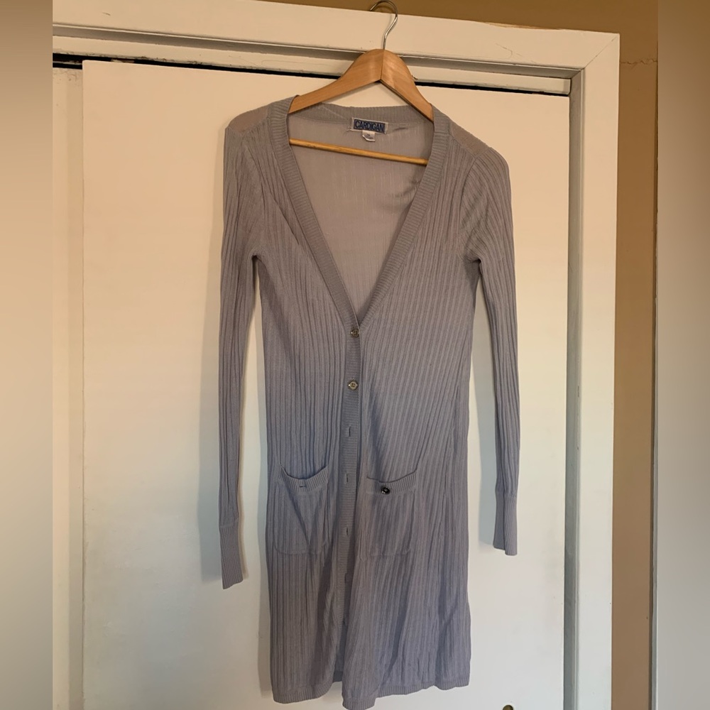 Cardigan with silver buttons.